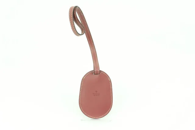Gucci Mauve Leather Reversible Blooms Luggage Tag Bag Charm Clochettes in Leather from Bagriculture, photo 1 of 1