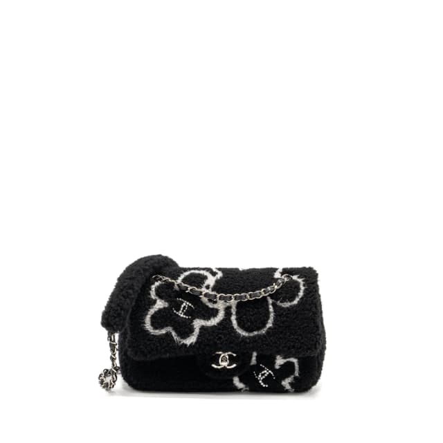 Chanel 22A Fluffy Camellia Flap Bag Embroidered Shearling Lambskin Black / White SHW (Microchip) in Black Lambskin from EMIER, photo 1 of 1