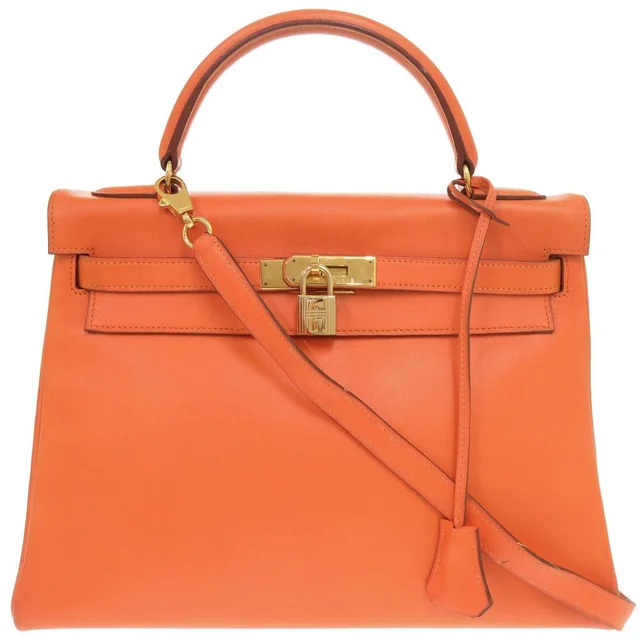 Hermès Kelly 32 Retourne Voga River Orange Gold Handbag in Orange from The Reluxe, photo 1 of 1