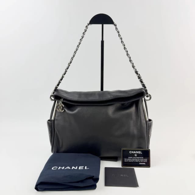 Chanel CC Logo Side Pocket Charm Chain Shoulder Bag Leather Black Silver Seal in Black Leather from The Reluxe, photo 1 of 1