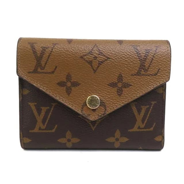 Louis Vuitton Trifold Wallet Monogram Reverse Portefeuille Victorine in Leather from The Reluxe, photo 1 of 1