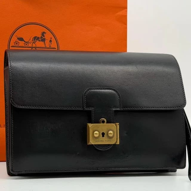 Hermès Pochette Jet Box Calf in Box leather from The Reluxe, photo 1 of 1
