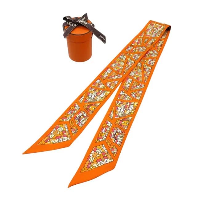 Hermès Twilly Right Bank and Left Scarf Silk Orange Multicolor in Orange Silk from The Reluxe, photo 1 of 1