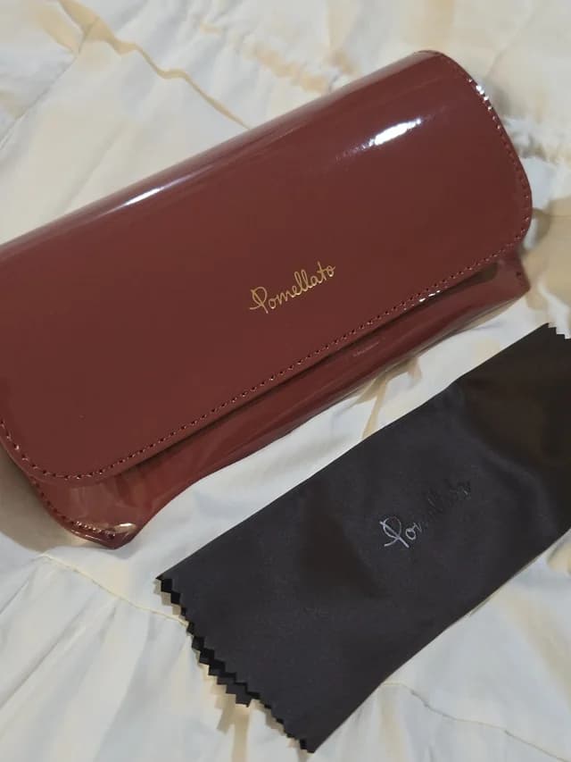 Pomellato Patent Sunglasses Case In Deep Burgundy With Cloth in red Patent leather from Poshmark, photo 1 of 1