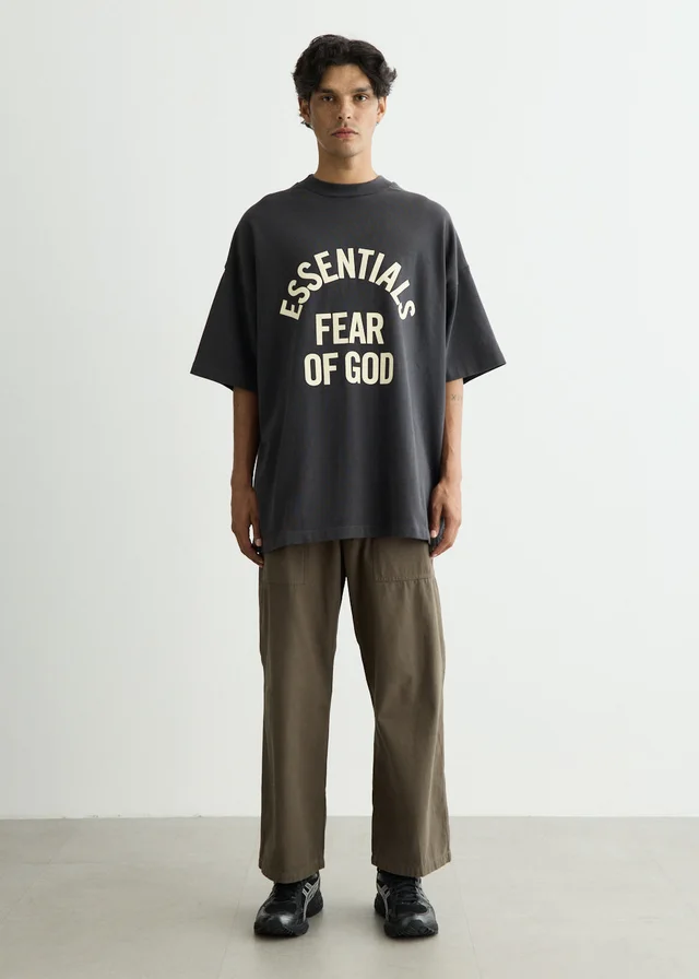 Fear of God Essentials Campus 90's Short Sleeve T-Shirt in FADED BLACK, image 1 of 1 from Incu