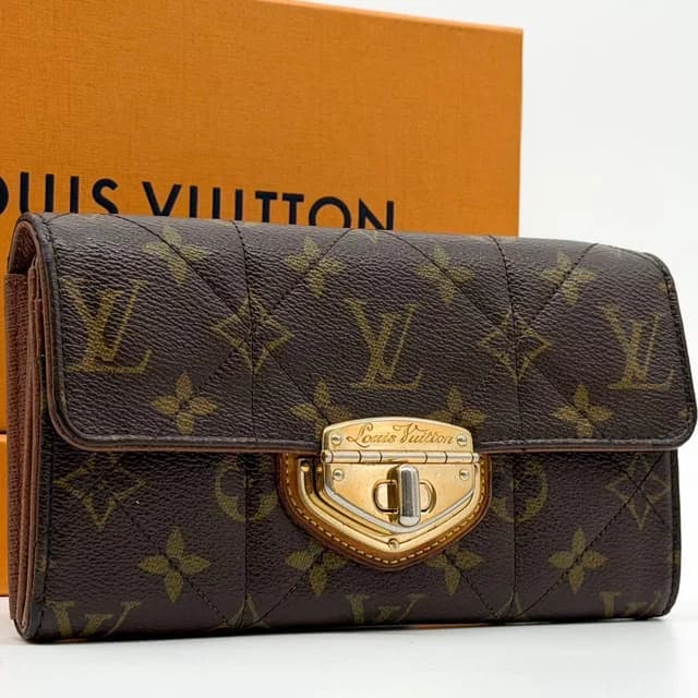 Louis Vuitton Pass Portefeuille Etoile Monogram Wallet from The Reluxe, photo 1 of 1