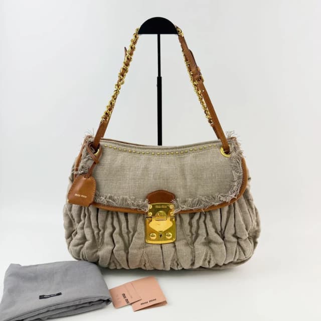 Miu Miu Matelasse Fringe Chain Shoulder Bag Canvas Leather Beige Brown Gold in Brown Canvas from The Reluxe, photo 1 of 1