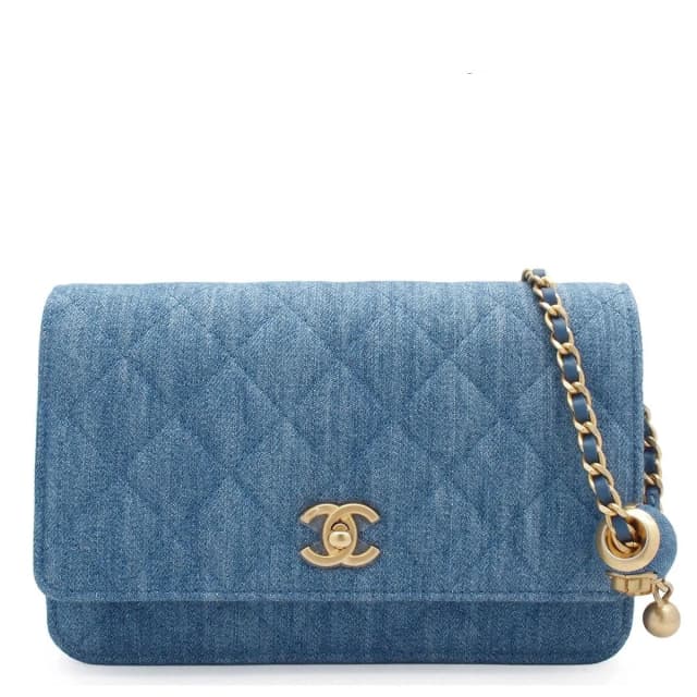 Chanel Quilted Chain Wallet Blue Gold Denim Lambskin Coco Ball Random Shoulder in Blue Lambskin from The Reluxe, photo 1 of 1