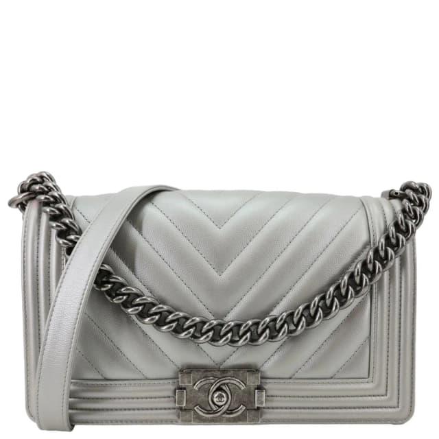 Chanel Boy Flap Medium Chevron Quilted Metallic Caviar Leather Crossbody Bag Silver in Silver Caviar leather from Dallas Designer Handbags, photo 1 of 1