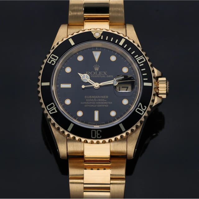 Rolex Submariner 16618 40mm Gold Watch in Gold from H&T, photo 1 of 1