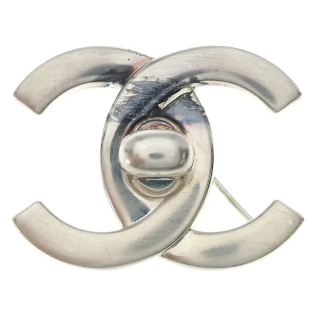 Chanel CC Logo Turnlock Brooch Silver Metal in Silver from The Reluxe, photo 1 of 1