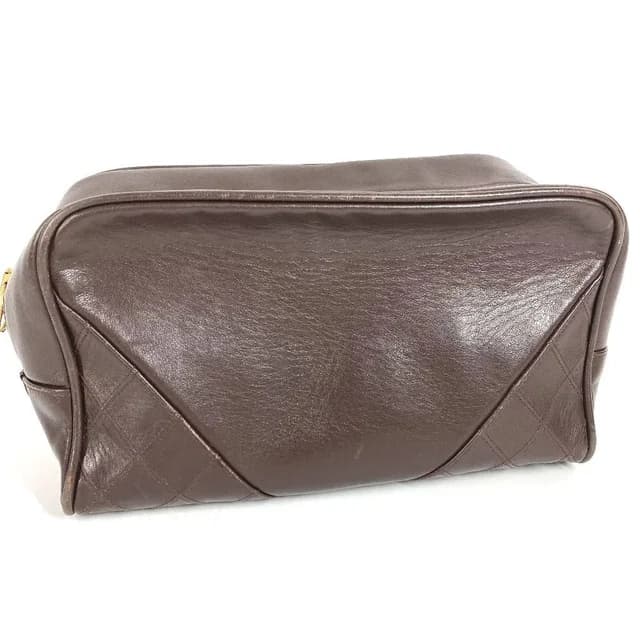 Chanel Clutch Quilted Logo Leather Brown in Brown Leather from The Reluxe, photo 1 of 1