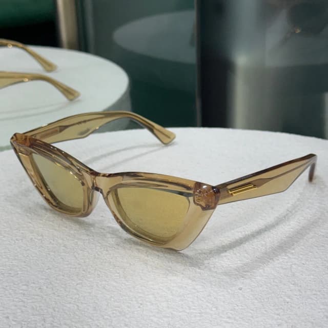 Bottega Veneta Transparent Cat Eye Sunglasses in Gold from Revivre Luxury Consignment, photo 1 of 1
