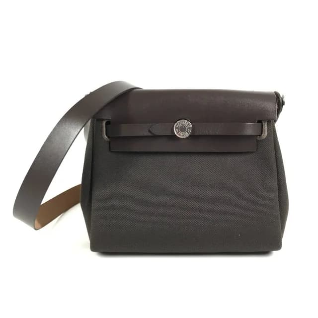 Hermès Shoulder Bag Herbag Zip Mini Toile Military Brown in Brown from The Reluxe, photo 1 of 1