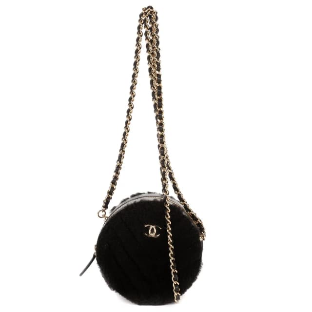 Chanel CC Shearling Chevron Round Crossbody Black Canvasa in Black Canvas from The Reluxe, photo 1 of 1