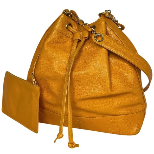 Chanel Shoulder Bag Triple CC Logo Drawstring Caviar Leather Yellow in Yellow Caviar leather from The Reluxe, photo 1 of 1