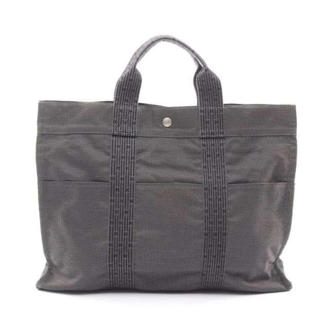 Hermès Tote Bag Herline MM Dark Gray Canvas Her MM in Grey Canvas from The Reluxe, photo 1 of 1