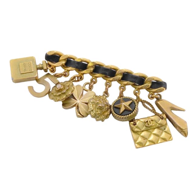 Chanel Brooch Vintage CC Logo Camellia Icon Charm Gold Plated Leather Faux in Gold Leather from The Reluxe, photo 1 of 1