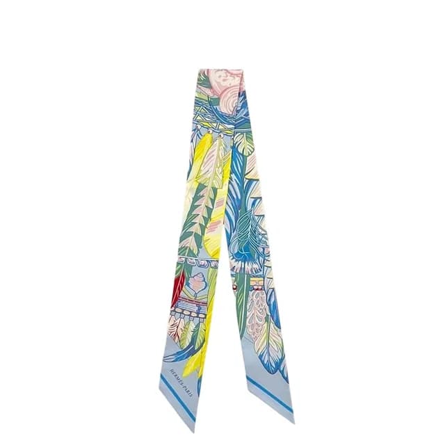 Hermès Twilly Ribbon Scarf Twilight Blue Yellow Dance Pacific Already Cleaned Silk in Blue Silk from The Reluxe, photo 1 of 1