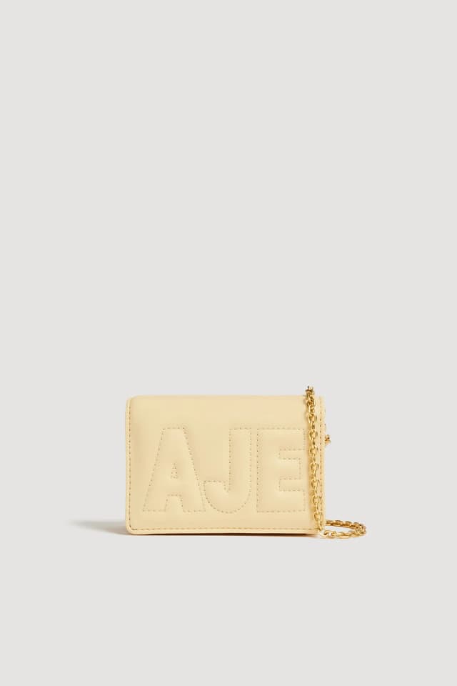 AJE Vera Wallet Crossbody in BUTTER YELLOW, image 1 of 1 from Aje