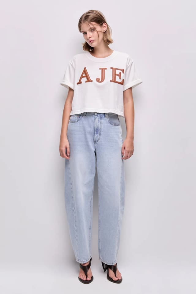 AJE Danila Logo Cropped Tee in WHITE/DARK TAN, image 1 of 1 from Aje