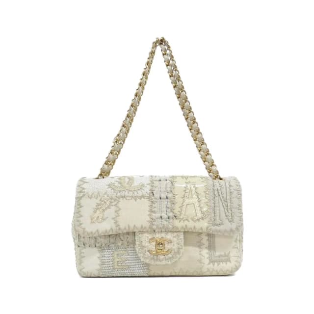 Chanel Shoulder Bag Ivory in White Canvas from The Reluxe, photo 1 of 1