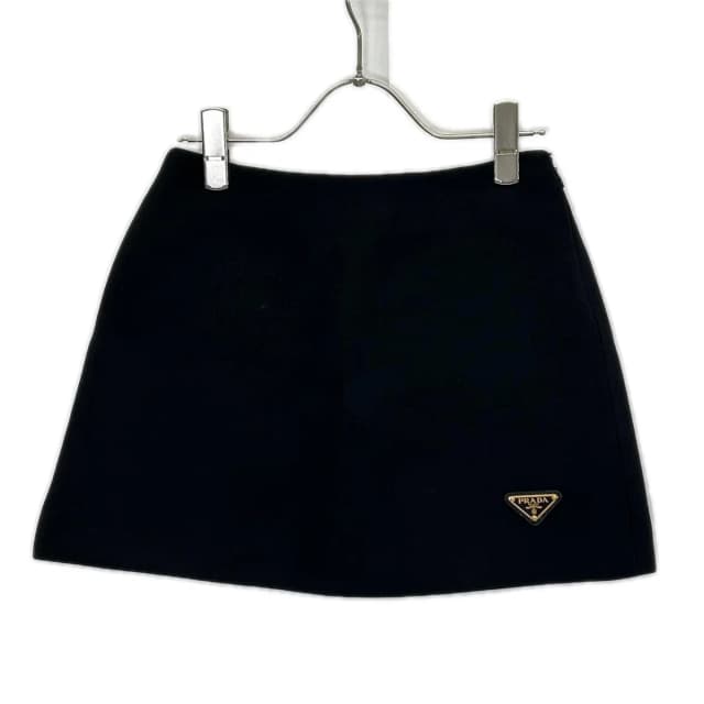Prada Triangle Logo Wool Mini Skirt 38 in Black Wool from The Reluxe, photo 1 of 1