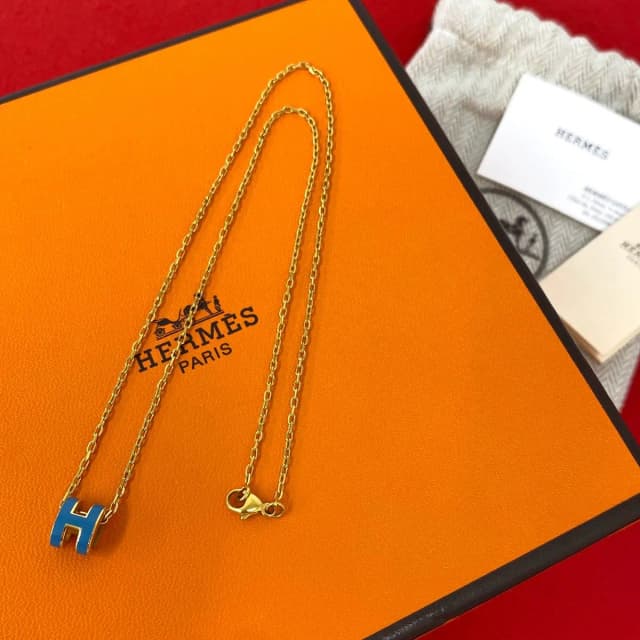 Hermès Box Mini Pop H Pendant Gold Blue Jean in Blue from The Reluxe, photo 1 of 1