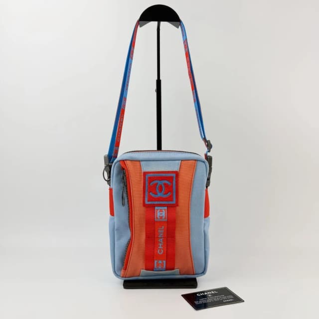 Chanel Sports Line Shoulder Bag Cross Nylon Canvas Light Blue Orange Red Seal in Red Canvas from The Reluxe, photo 1 of 1