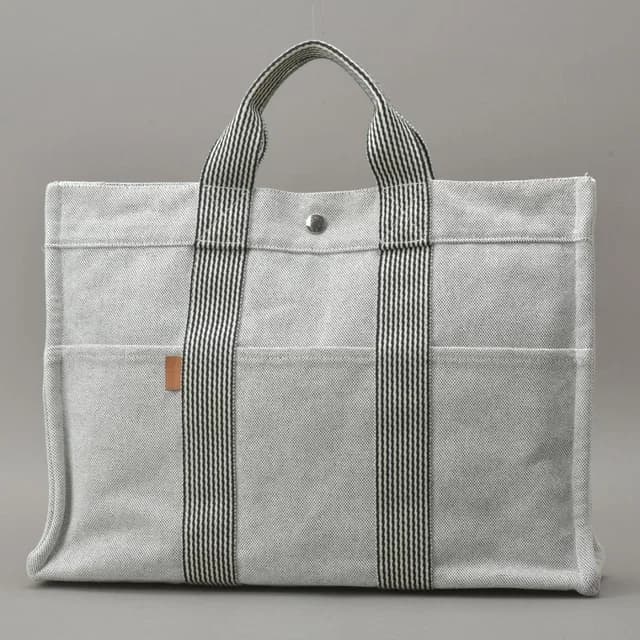 Hermès New Fourre Tout MM Tote Bag Canvas Gray Black in Black Canvas from The Reluxe, photo 1 of 1