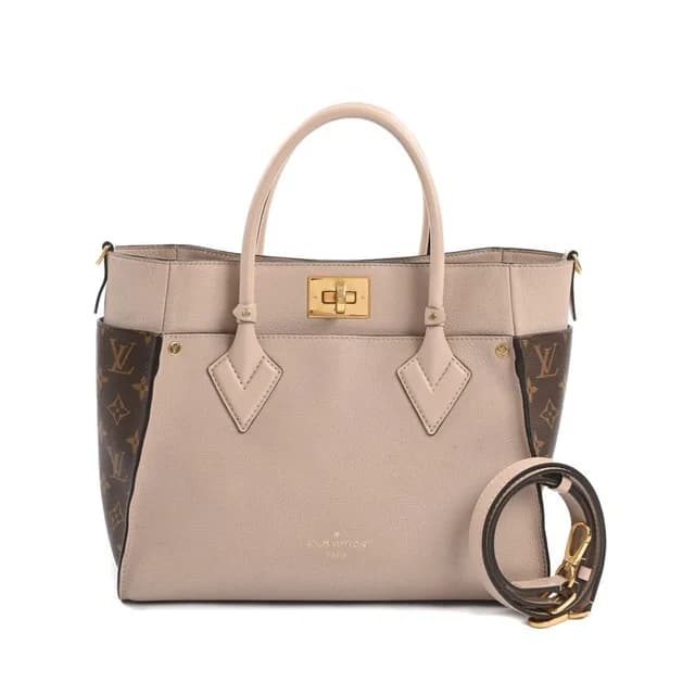 Louis Vuitton Handbag On My Side MM in Leather from The Reluxe, photo 1 of 1