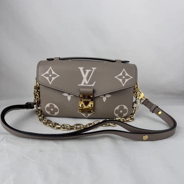 Louis Vuitton Pochette Metis East West Bag in Empreinte leather, Metal from Reowned, photo 1 of 1