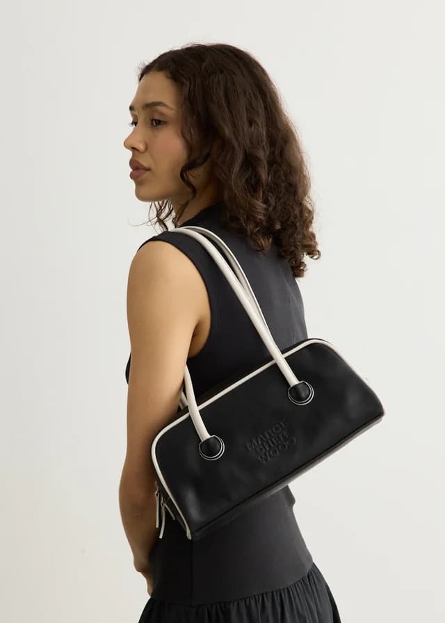 MARGESHERWOOD Soft Baguette Bag With Piping in BLACK LIGHT GREY PULL-UP, image 1 of 1 from Incu