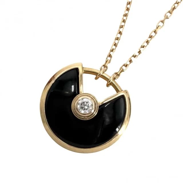 Cartier Necklace Amulet de Star 18K Pink Gold Onyx Diamond in Pink from The Reluxe, photo 1 of 1