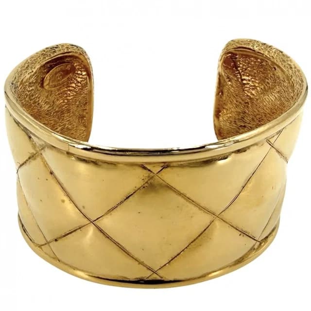 Chanel Bangle Bracelet CC Logo Vintage Quilted Gold Plated in Gold Tweed from The Reluxe, photo 1 of 1