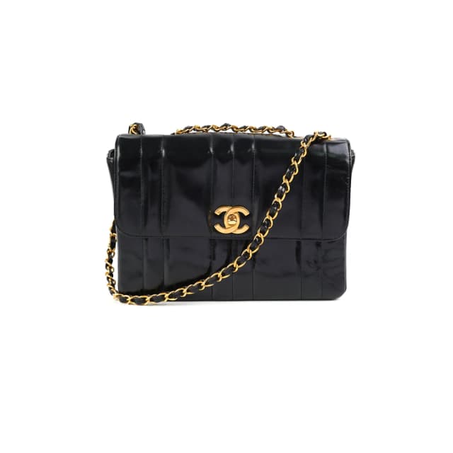 Chanel Vintage Vertical Half Flap Black Shiny Leather in Black Leather from The Purse Affair, photo 1 of 1