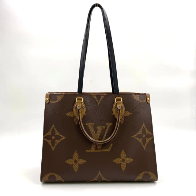 Louis Vuitton On The Go MM Monogram Giant Leather Brown Black Tote Bag Gold in Black Leather from The Reluxe, photo 1 of 1
