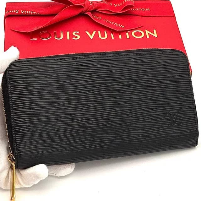 Louis Vuitton Wallet Epi Zippy Black Gold in Black from The Reluxe, photo 1 of 1