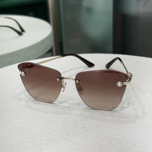 Jimmy Choo Sunglasses - Gold in Gold from Revivre Luxury Consignment, photo 1 of 1
