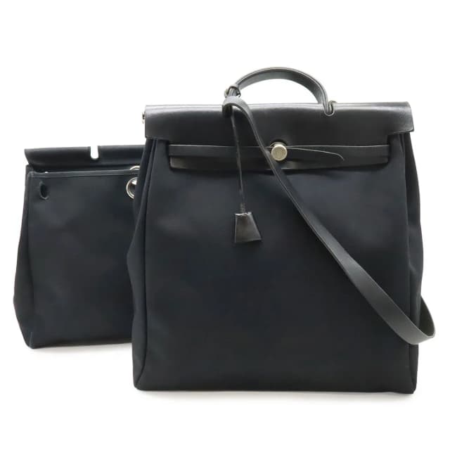 Hermès Herbag MM 2-Way Shoulder Bag Toile Officier Leather Black Silver in Black Leather from The Reluxe, photo 1 of 1