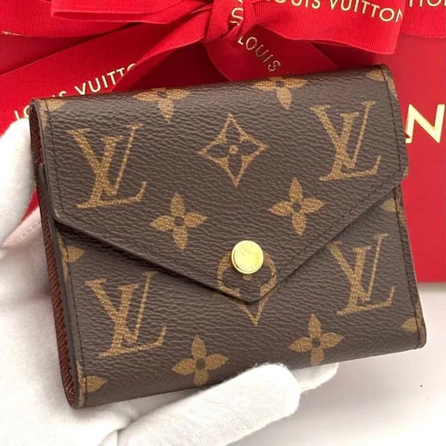 Louis Vuitton Wallet Monogram Portefeuille Victorine Brown in Brown from The Reluxe, photo 1 of 1