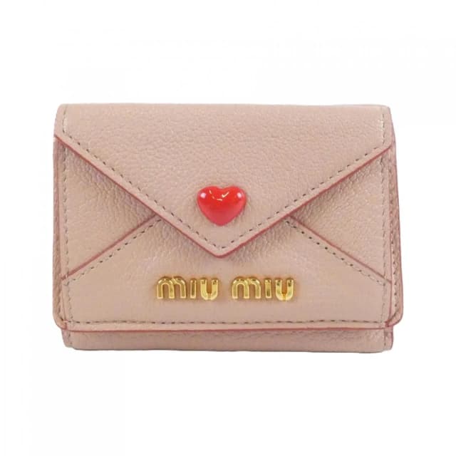 Miu Miu Wallet Gold in Gold from The Reluxe, photo 1 of 1