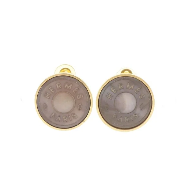 Hermès Sellier Gold Plated Shell Earrings in Gold from The Reluxe, photo 1 of 1