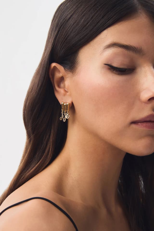 AJE Charm Logo Stud in GOLD, image 1 of 1 from Aje