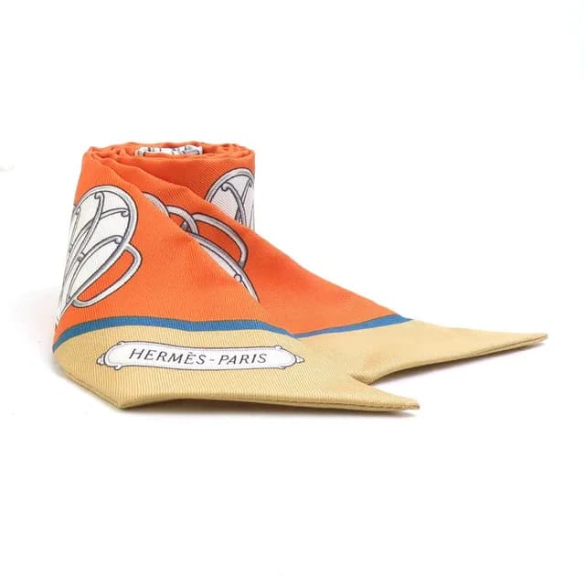 Hermès Scarf Twilly Scarves Orange in Orange Silk from The Reluxe, photo 1 of 1