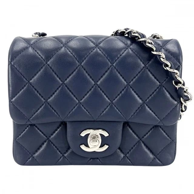 Chanel Shoulder Bag Mini Quilted Turnlock Single Chain Flap Crossbody CC Logo in Caviar leather from The Reluxe, photo 1 of 1