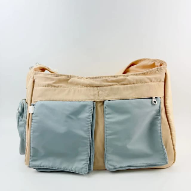 Chanel Sports Line CC Logo Multi Pocket Shoulder Bag Nylon Beige Light Blue in Beige Nylon from The Reluxe, photo 1 of 1