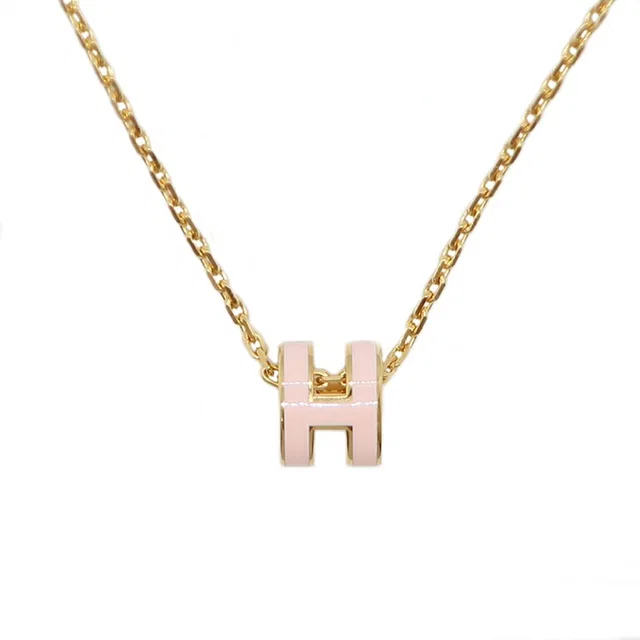 Hermès Necklace Mini Pop H Rocabar Pink Gold Logo Pendant in Pink from The Reluxe, photo 1 of 1