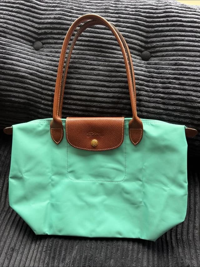 Longchamp Le Pliage Medium Turquoise Green Tote Bag With Brown Leather Trim in green|brown|red Leather from Poshmark, photo 1 of 1