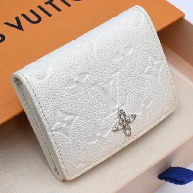 Louis Vuitton Empreinte Envelope Line Stowe White Wallet in White Leather from The Reluxe, photo 1 of 1